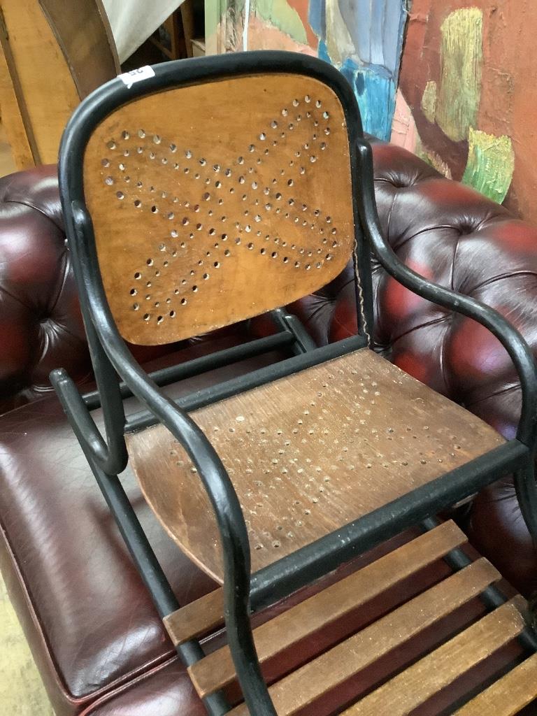 An early 20th century child's bentwood twin seat rocking chair, length 120cm